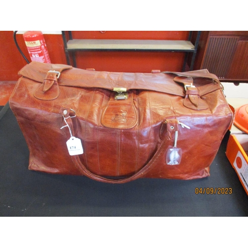 174 - A leather holdall