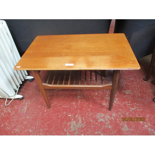 221 - A mid-century teak rectangular coffee table fitted an under tier