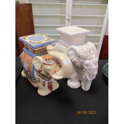 242 - Two ceramic plant stands each modelled in the form of a ceremonial Indian elephant