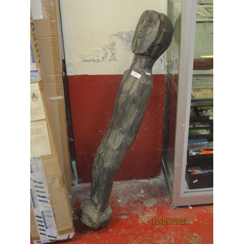 305 - A large African carved tribal figure