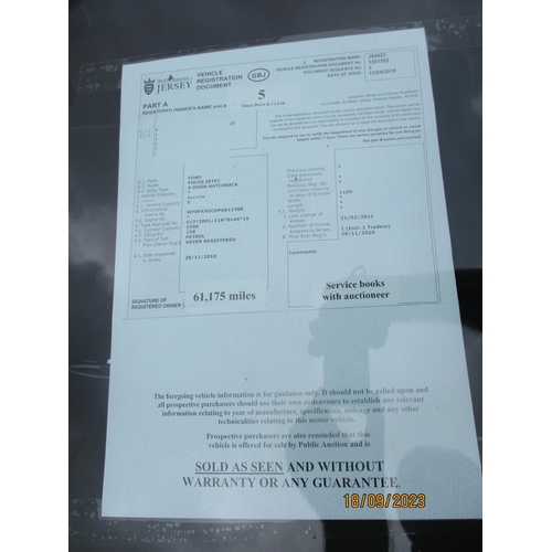 5 - A 2010 Ford Focus Zetec 1.6 five door hatchback J94423 (petrol/manual), odometer reading 61,175 mile... 