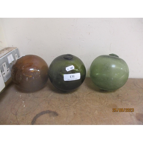 131 - Three vintage glass fishing floats