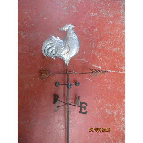 132 - A metallic weather vane modelled in the form of a cockerel