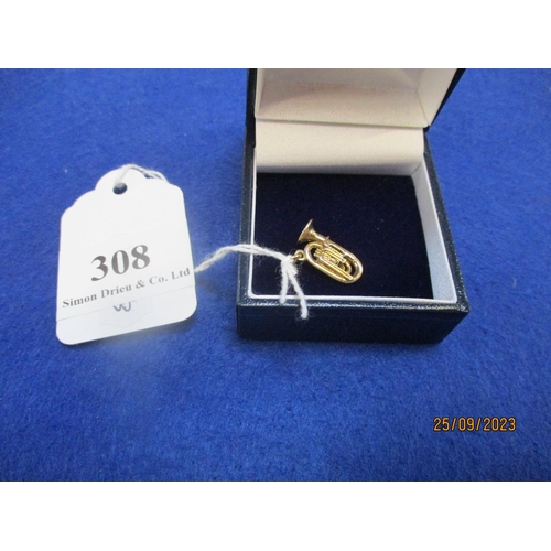 308 - A heavy 9 carat gold trumpet pendant