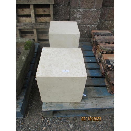 49 - A pair of simulated marble cubic stands