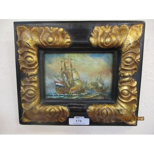 174 - A study of galleons at war mounted within an ebonised and gilded frame