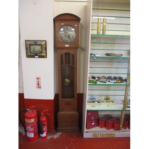 175 - A turn of the twentieth century oak long cased clock