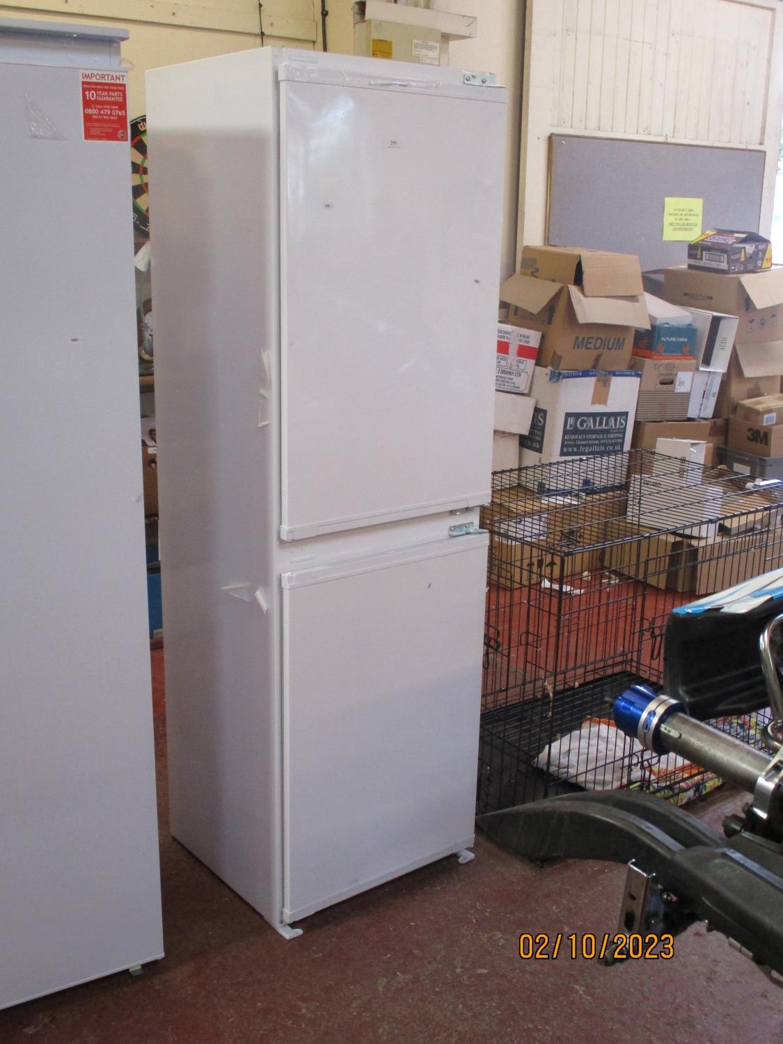 A Zenith integrated fridge freezer new shop soiled