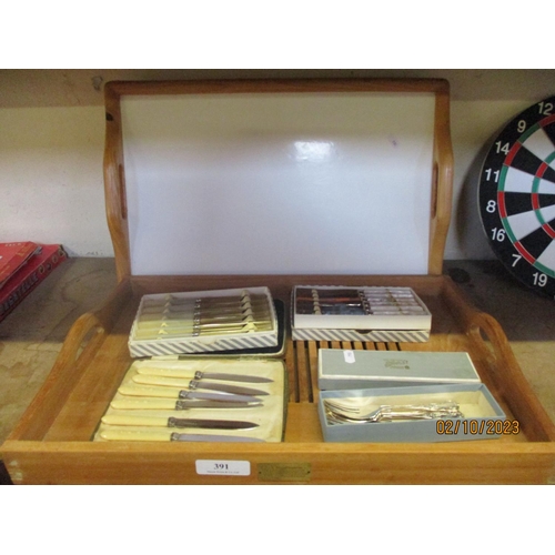 391 - Two serving trays together with a range of boxed flat ware