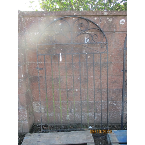 50 - A wrought metal arched garden gate