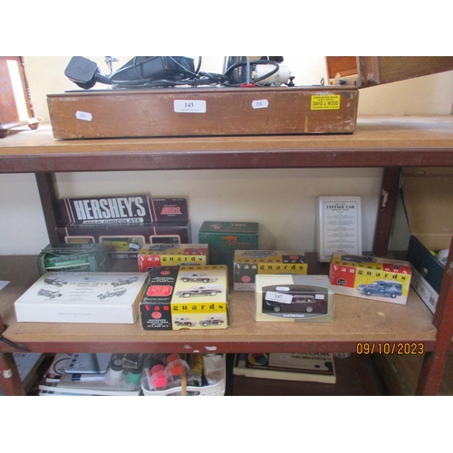 147 - A collection of boxed diecast model vehicles