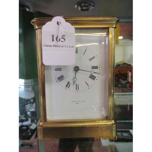 165 - A vintage French brass cased carriage clock