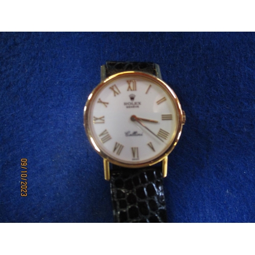 172 - A Rolex Cellini 18 carat gold wrist watch on leather strap