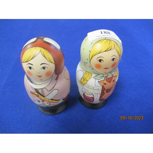 188 - A pair of Matryoshka dolls, signed