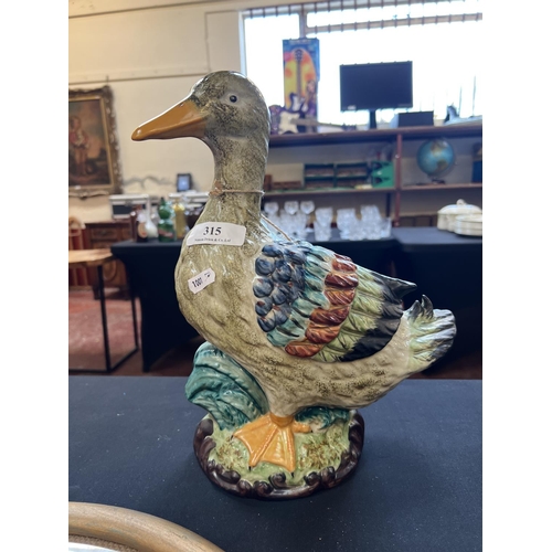 315 - A glazed ceramic model of a duck