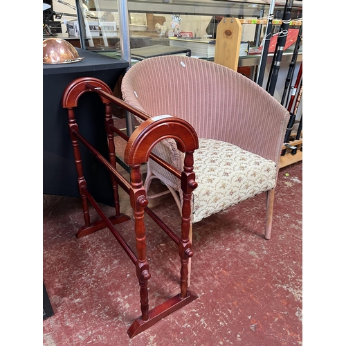 347 - An early twentieth century rattan armchair together with a towel rail in the Victorian style