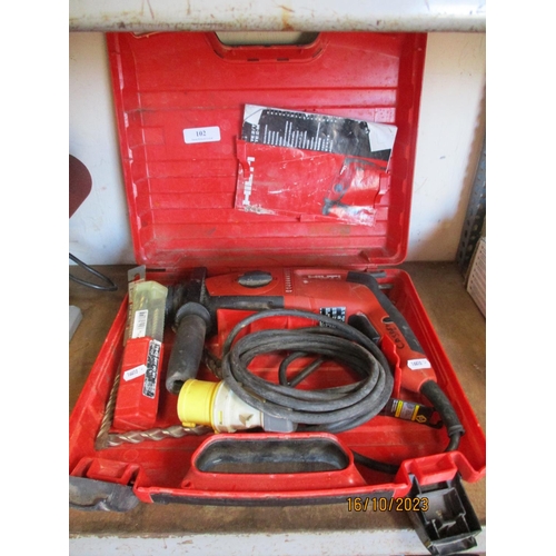 102 - A Hilti TE2-M 110 volt rotary hammer drill and accessories