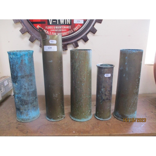 125 - Five vintage brass ammunition shell cases