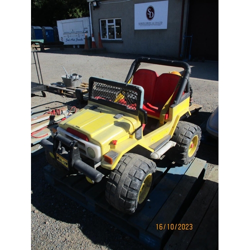 77 - A child's 12 volt ride in toy jeep (requires battery)