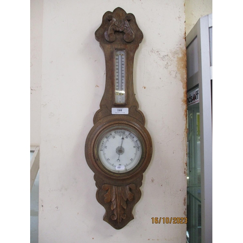 144 - A vintage oak cased barometer