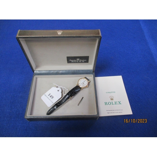 149 - A Rolex Cellini 18 carat gold wrist watch on leather strap