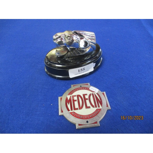 155 - A vintage Peugeot motor car mascot mounted on a plinth together with a vintage French Medcin car gri... 