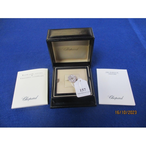 157 - A Chopard Happy Diamonds white gold ring in original box and complete with documentation
