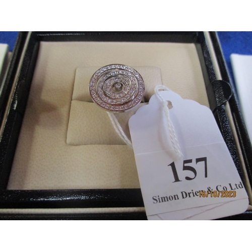 157 - A Chopard Happy Diamonds white gold ring in original box and complete with documentation