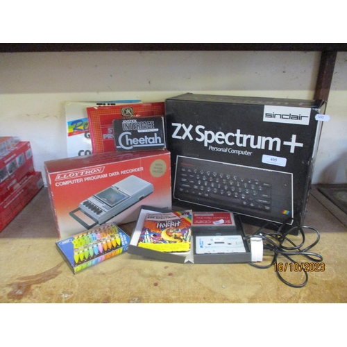 405 - An original Sinclair ZX Spectrum + personal computer together with a variety of associated equipment