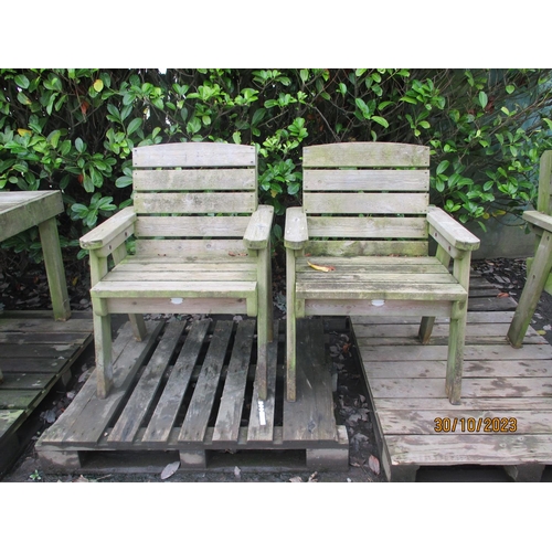 52 - A pair of Huttons wooden garden chairs