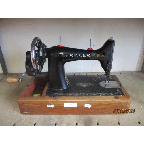 107 - A vintage Singer hand portable sewing machine