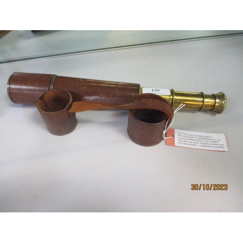 139 - A vintage leather clad brass telescope by Messrs. Broadhurst, Clarkson & Co. Limited