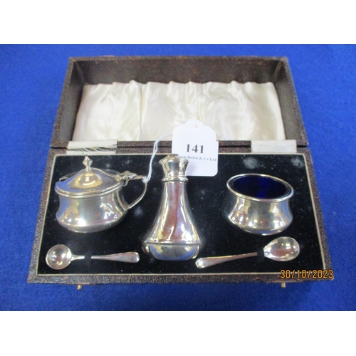 141 - A cased silver three piece cruet set