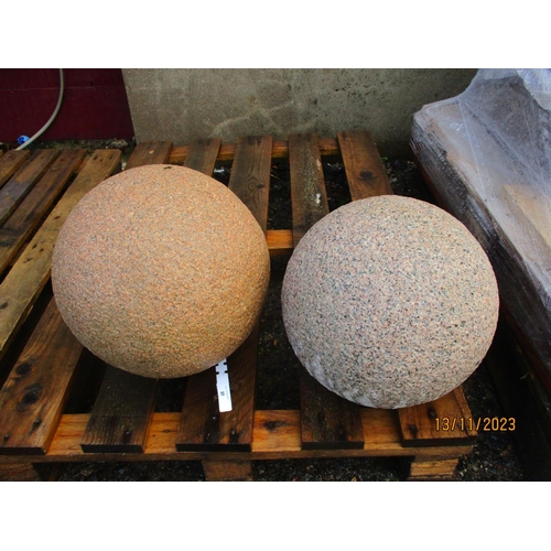 48 - Two granite spheres/finials