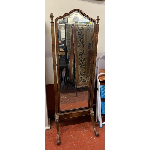 434 - An early twentieth century burr walnut bevelled cheval mirror