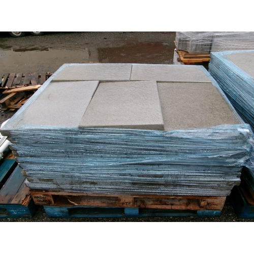 63 - A pallet of grey coloured textured paving slabs