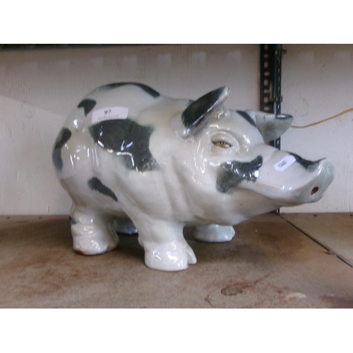 97 - A large glazed ceramic model of a pig