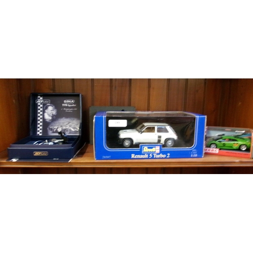 189 - Three diecast model vehicles in original packaging