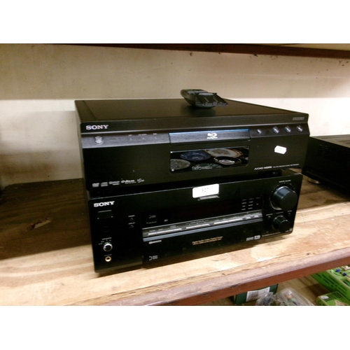 327 - A Sony Blu-ray/DVD player together with a Sony FM stereo receiver