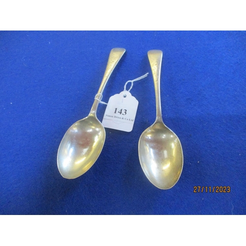 143 - A pair of silver bright cut dessert spoons