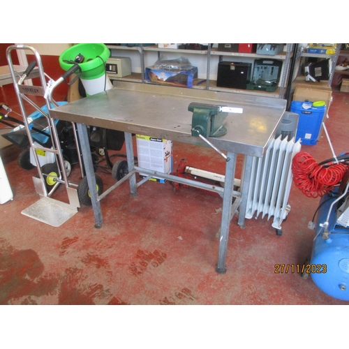 76 - A stainless steel work table fitted an engineer's bench vice