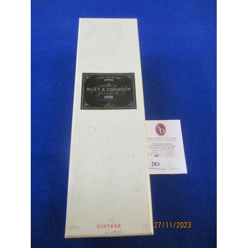 283 - A presentation bottle of 1998 Moet & Chandon Millesime Blanc 1998 Vintage Champagne - sealed