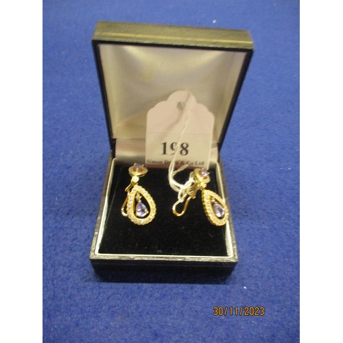 198 - A pair of Dyach Tanzanite and diamond earrings