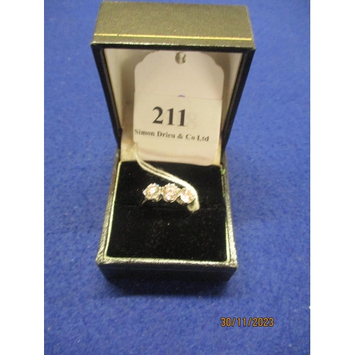 211 - A three diamond (total 2.31 carats) 18 carat white gold ring size Q