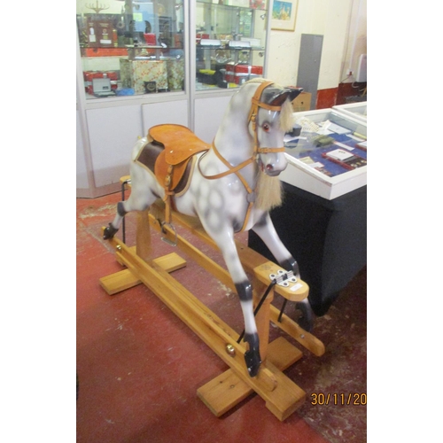 227 - A large antique style hand made dapple grey rocking horse