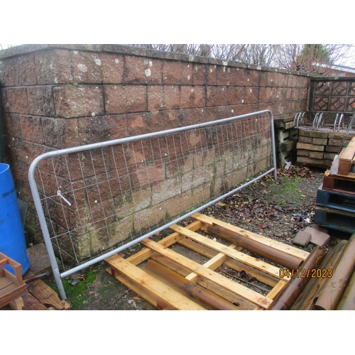 20 - A galvanised mesh barrier