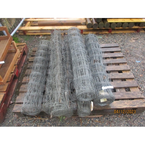 21 - Seven rolls of galvanised carnation wire