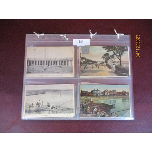 283 - A collection of vintage postcards