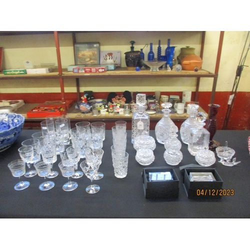 288 - Assorted crystal decanters, drinking glasses and models