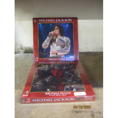 314 - Two 500 piece Michael Jackson jigsaw puzzles - both factory sealed